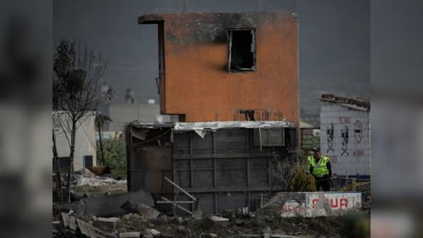 Explosions rip through fireworks warehouses in town north of Mexico City; 24 killed, dozens injured