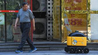 'Little yellow horse': How autonomous robots are delivering essentials in China
