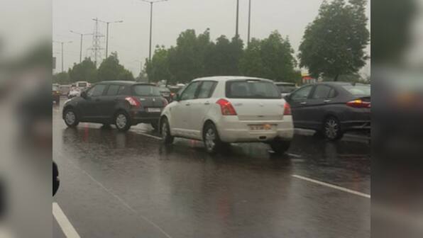 Delhi rains updates: Road caves in at Ghaziabad as parts of NCR witness heavy showers, waterlogging