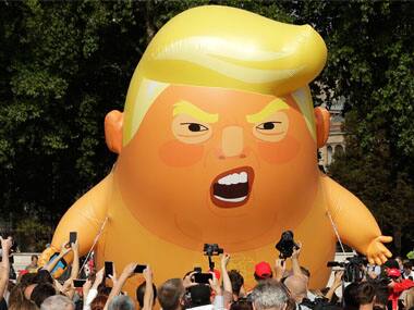 'Dump Trump': Thousands protest in London against US president's immigration, climate change policies