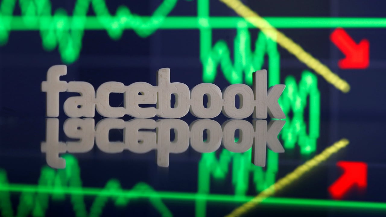A 3D-printed Facebook logo is seen in front of displayed stock graph in this illustration photo March 20, 2018. Picture taken March 20. REUTERS/Dado Ruvic - RC1E83A25650
