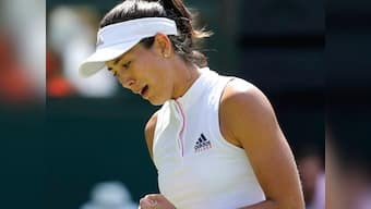 Wimbledon 2018: Defending champion Garbine Muguruza wins in straight sets against British wild card Naomi Broady