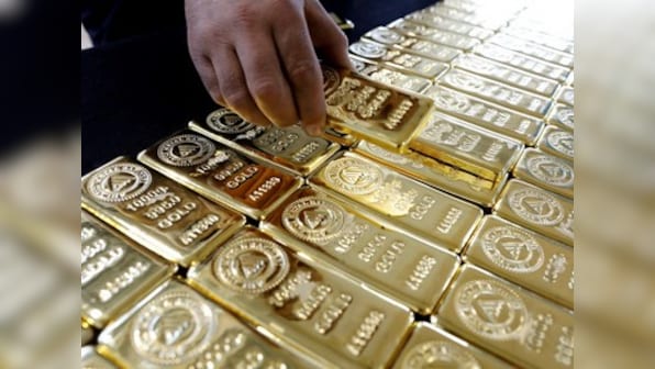 Gold retraces from two-week peak as investors lock in profits; Fed may lower interest rates by 25 basis points