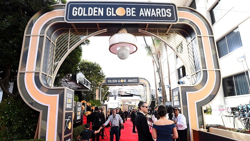Media and crew appear on the red carpet at the 75th annual Golden Globe Awards in Beverly Hills, California. The Associated Press/ Jordan Strauss