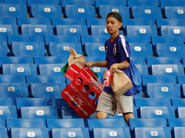 FIFA World Cup 2018: Japan team cleans out locker room, fans stay back to help stadium workers after devastating defeat FIFA World Cup 2018: Japan team cleans out locker room, fans stay back to help stadium workers after devastating defeat