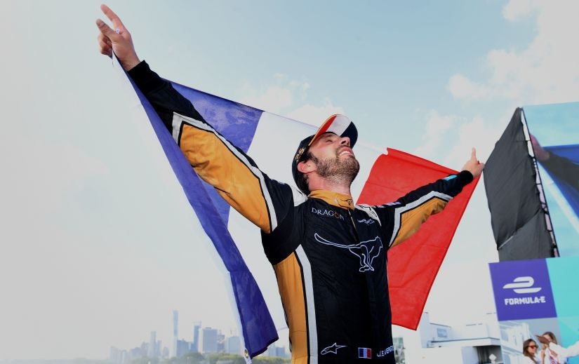 Techeetah's Jean-Eric Vergne celebrates on the podium after winning the championship. Image courtesy: Techeetah Formula E Team