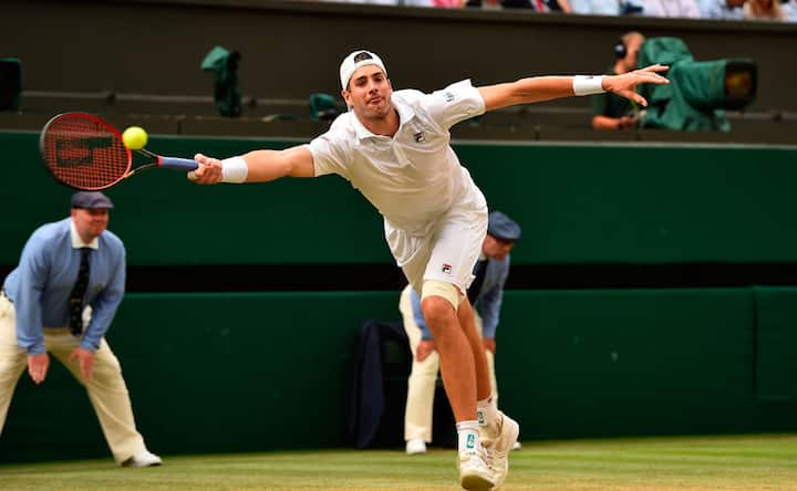 John Isner and Kevin Anderson play out second-longest Wimbledon match; Rafael Nadal, Novak Djokovic match delayed John Isner and Kevin Anderson play out second-longest Wimbledon match; Rafael Nadal, Novak Djokovic match delayed