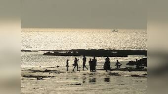 One dead and three feared to have drowned at Juhu Chowpatty; one rescued as navy and coast guard join search