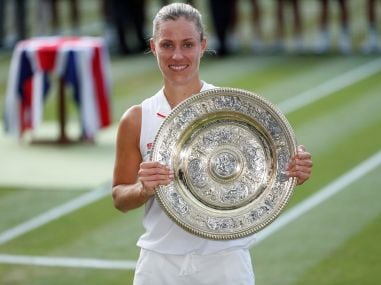   Angelique Kerber celebrates the victory of the Wimbledon final with the trophy, Reuters 