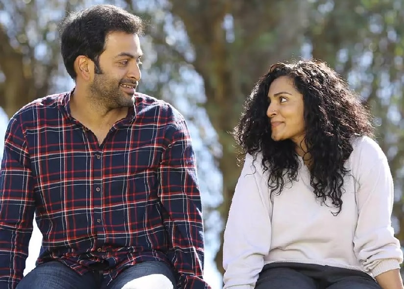 Prithviraj and Parvathy in a still from Koode. Image via Facebook