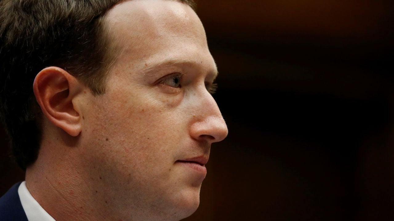 Facebook CEO Mark Zuckerberg testifies before a House Energy and Commerce Committee hearing regarding the company's use and protection of user data on Capitol Hill in Washington, U.S., April 11, 2018. REUTERS/Leah Millis - RC1B8AF06ED0