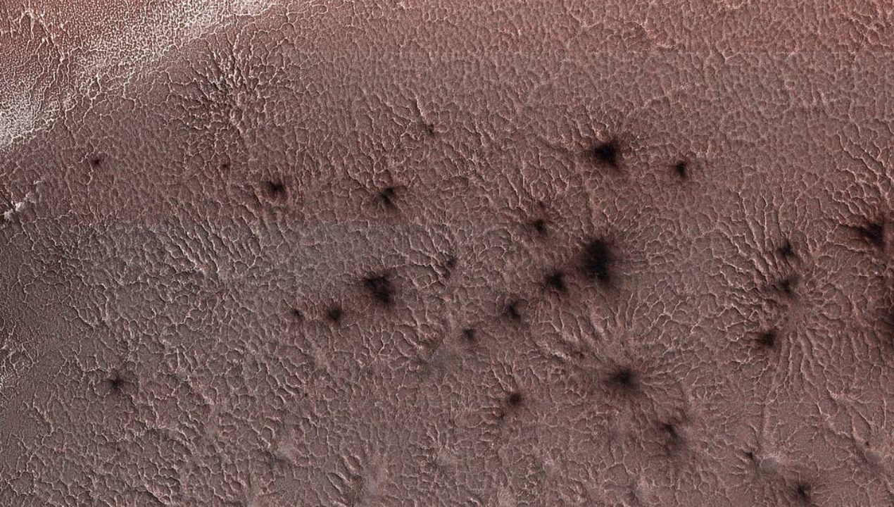 NASA releases new image showing 'spiders' crawling on the surface of Mars NASA releases new image showing 'spiders' crawling on the surface of Mars