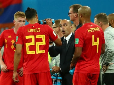    Belgian coach Roberto Martinez gives instructions to Nacer Chadli. Reuters 