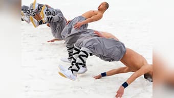 Chinese sports authorities recruit Shaolin monks, teach them snow and ice disciplines to boost Beijing Winter Olympics squads