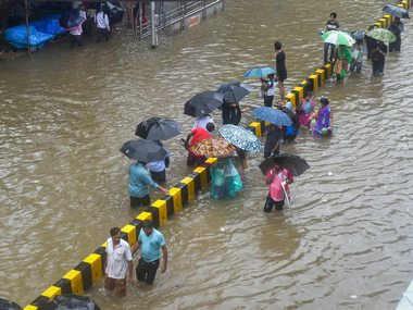 Mumbai rains hit rail and road traffic; NDRF called in to rescue over 450 stranded passengers, navy on standby Mumbai rains hit rail and road traffic; NDRF called in to rescue over 450 stranded passengers, navy on standby