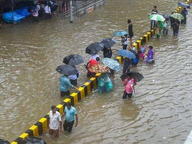 Mumbai rains hit rail and road traffic; NDRF called in to rescue over 450 stranded passengers, navy on standby