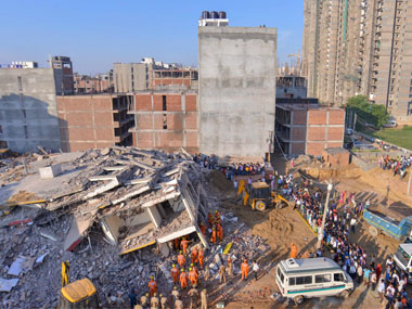 Noida twin-building collapse: Toddler, women among 9 dead as rescue operations continue; 5 arrested so far Noida twin-building collapse: Toddler, women among 9 dead as rescue operations continue; 5 arrested so far