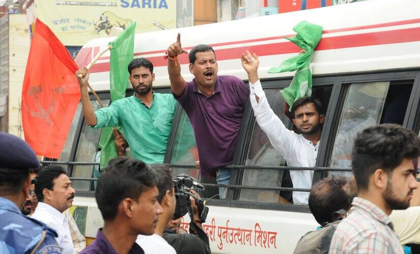 Police personnel’s detain party workers and supporters after protest during 24 hours Jharkhand bandh called by all opposition parties over the land acquisition bill passed by state government, in Ranchi. Image Courtesy: Mukesh Kumar Bhatt/ 101 Reporters