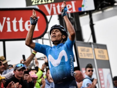 . Colombian Nairo Quintana celebrates his victory by crossing the finish line to win the 17th stage of the Tour de France. AFP 