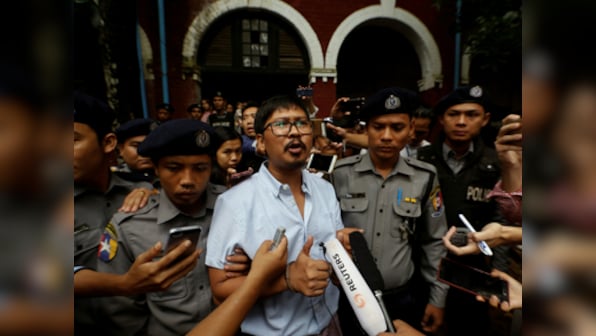 Reuters journalists to face trial for breaching Mayanmar's secrecy law; scribes were investigating massacre of Rohingya Muslims