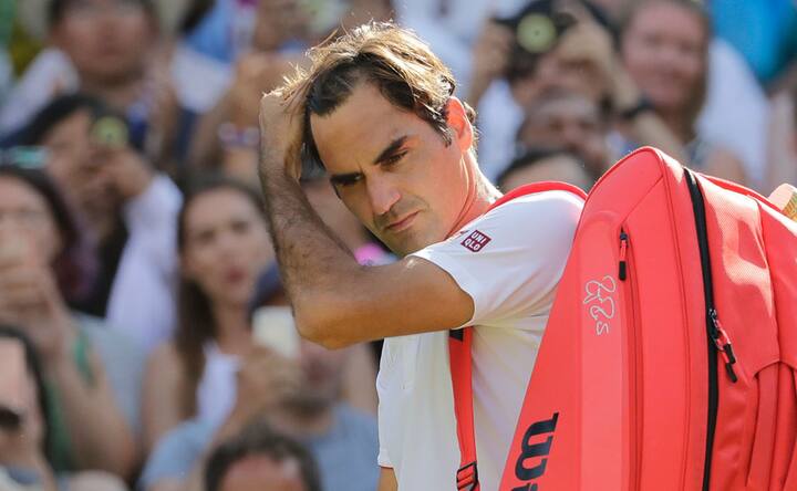 Defending champion Roger Federer knocked out of Wimbledon; Rafael Nadal, Novak Djokovic win to set up semi-final clash Defending champion Roger Federer knocked out of Wimbledon; Rafael Nadal, Novak Djokovic win to set up semi-final clash