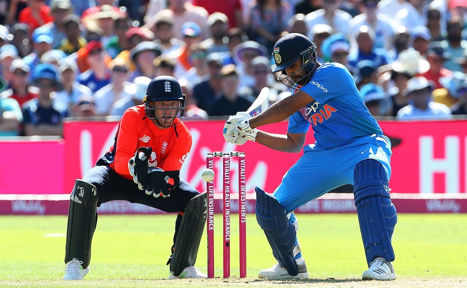 Indian opener Rohit Sharma scored his third T20 International hundred with 100 off 56 balls, as India chased down England's score of 198 in 18.4 overs. AP Indian opener Rohit Sharma scored his third T20 International hundred with 100 off 56 balls, as India chased down England's score of 198 in 18.4 overs. AP