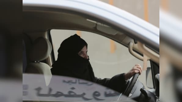 Days after Saudi Arabia lifts ban on female drivers, men 'opposed' to move set woman's car ablaze
