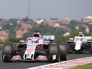   Force India pilot Sergio Perez drives his car in the first test session for the Hungarian Grand Prix AP 