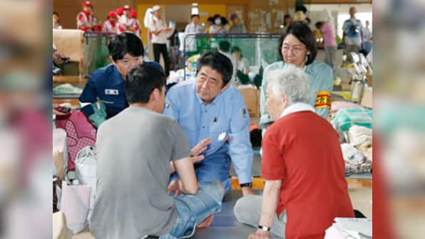 Japan deluge: Flash floods, landslides kill 204; 28 missing as Shinzo Abe meets survivors and pledges more aid
