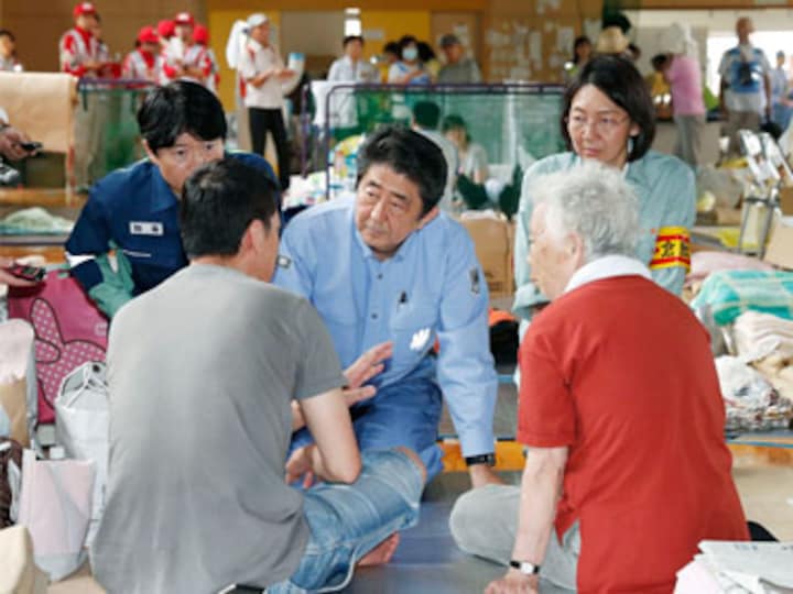 Japan deluge: Flash floods, landslides kill 204; 28 missing as Shinzo Abe meets survivors and pledges more aid
