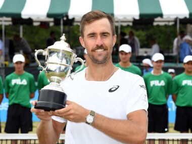 Steve Johnson poses after winning the ATP Newport title. Twitter: SJohnson_89