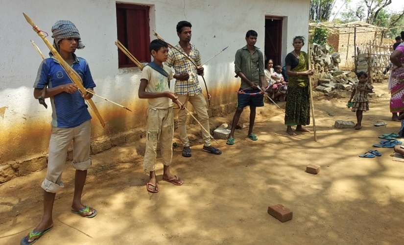Tribals gaurding their territory with bow and arrow after pathalgadi. Image courtesy Chandrakant Pargir