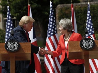 Theresa May says Donald Trump advised her to sue European Union over Brexit negotiations Theresa May says Donald Trump advised her to sue European Union over Brexit negotiations