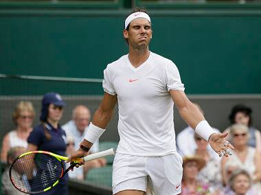 Rafael Nadal of Spain grimaces after loosing a point to Mikhail Kukushkin of Kazakhstan, during their men’s singles match, on the fourth day of the Wimbledon Tennis Championships in London, Thursday July 5, 2018. (AP Photo/Tim Ireland)