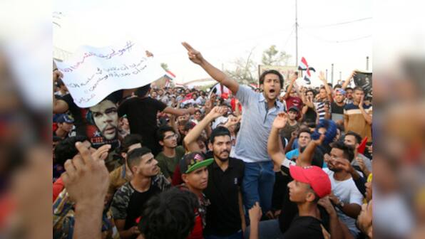 Toll rises to 9 after police firing kills another protester in Baghdad; Iraq says 260 security personnel wounded in clashes so far