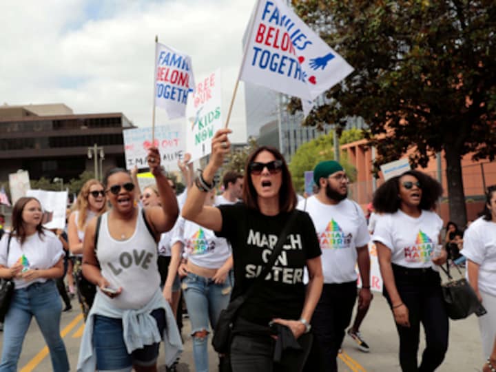 'No more children in cages': Protesters take to the streets in US demanding end to Trump's immigration policy
