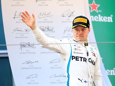 Formula One F1 - Chinese Grand Prix - Shanghai International Circuit, Shanghai, China - April 15, 2018 Mercedes' Valtteri Bottas on the podium after finishing second in the race REUTERS/Aly Song - RC1A65E27310