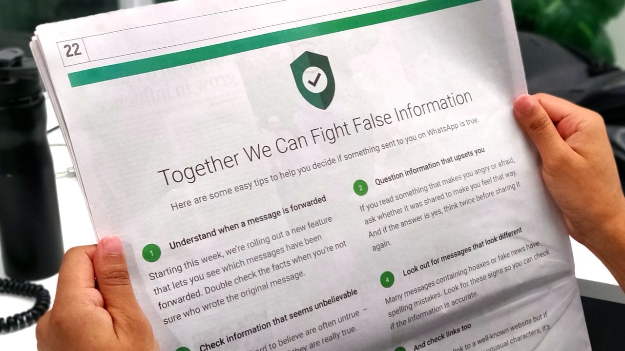 The WhatsApp newspaper ad on false information.