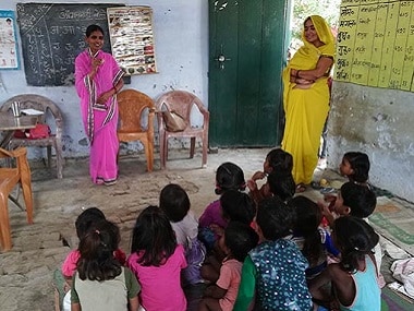 Anganwadi worker Madhubala, 47, at a pre-school education class at an anganwadi held in a primary school in Kuiya village, Farrukhabad. Image Courtesy: IndiaSpend/Swagata Yadavar