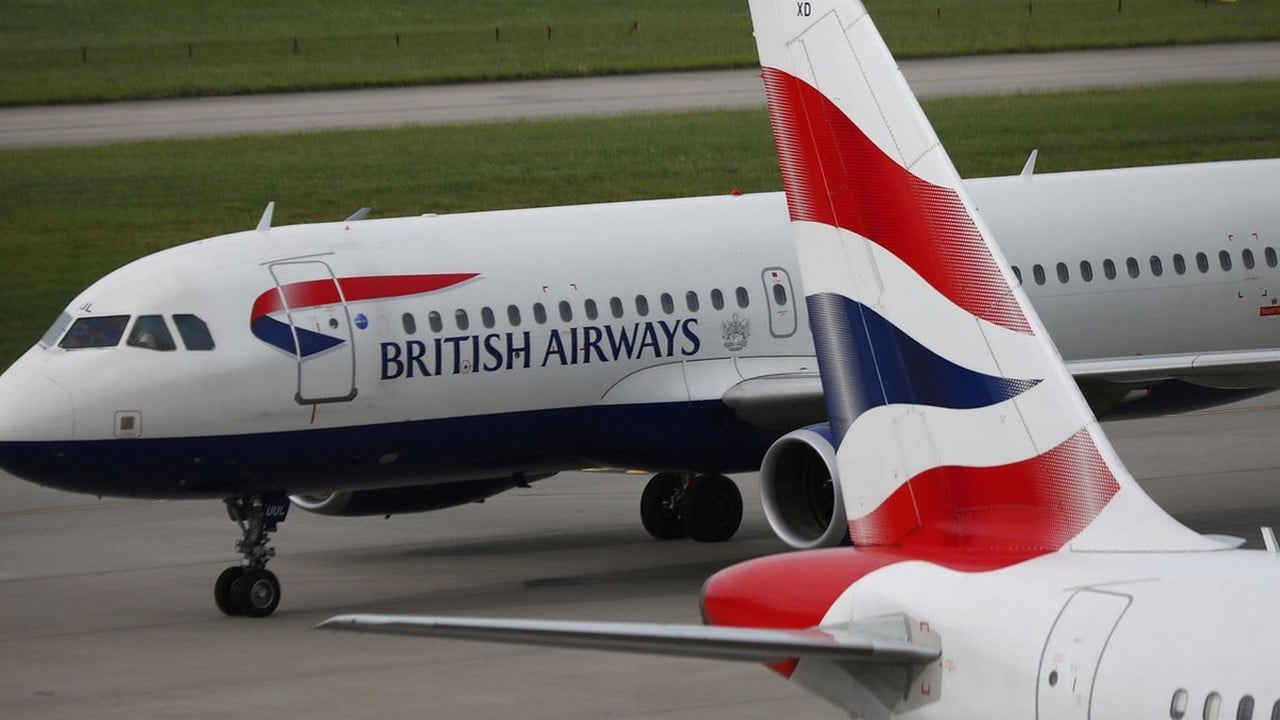 British Airways planes are parked at Heathrow Terminal 5 in London, Britain May 27, 2017. REUTERS/Neil Hall TPX IMAGES OF THE DAY - RTX37W6D