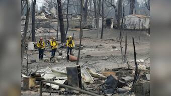 California wildfires: Thousands more flee; crews handling blaze near Redding hopeful after massive fire slows down
