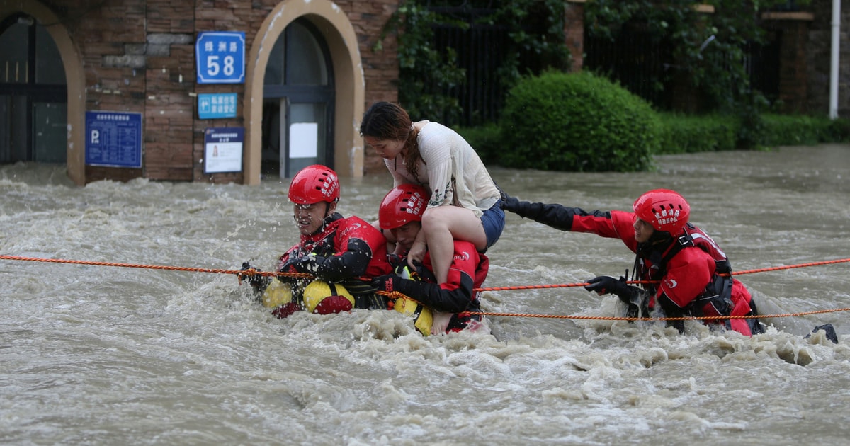 China Floods Kill 15 People, Force More Than 80,000 To Evacuate ...