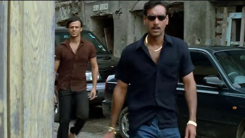 Ajay Devgn and Vivek Oberoi in a scene from Company(2002). YouTube Screengrab