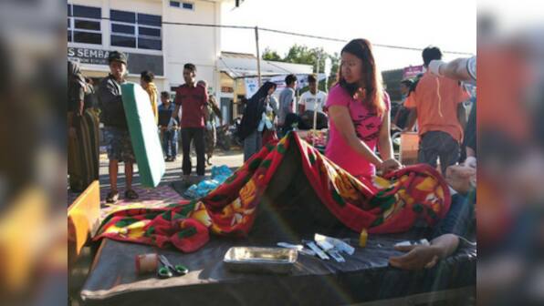 At least 10 dead as earthquake of 6.4 magnitude strikes Indonesia's Lombok; authorities temporarily shut mount Rinjani
