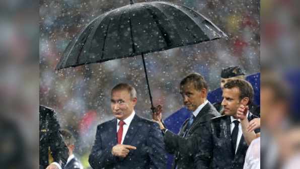 FIFA World Cup 2018: Vladimir Putin and his big umbrella at the finals spark a deluge of Twitter memes