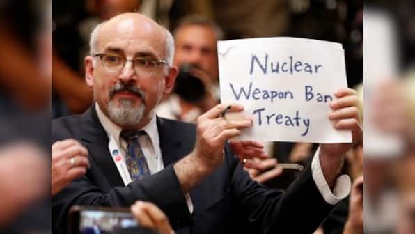 Trump-Putin summit in Helsinki: 'Journalist' Sam Husseini kicked out of press conference for raising protest sign