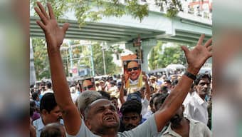 Karunanidhi battles for life: Outside Kauvery Hospital, DMK supporters hail 'Thailavar's' fighting spirit, hope for recovery