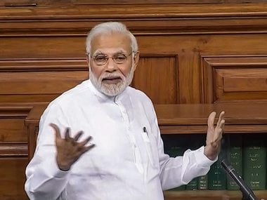 Narendra Modi speaking in Parliament on Friday. PTI