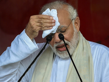 BJP supporters attack policemen after Narendra Modi's rally in Midnapore; TMC says PM came to district to 'create commotion' BJP supporters attack policemen after Narendra Modi's rally in Midnapore; TMC says PM came to district to 'create commotion'