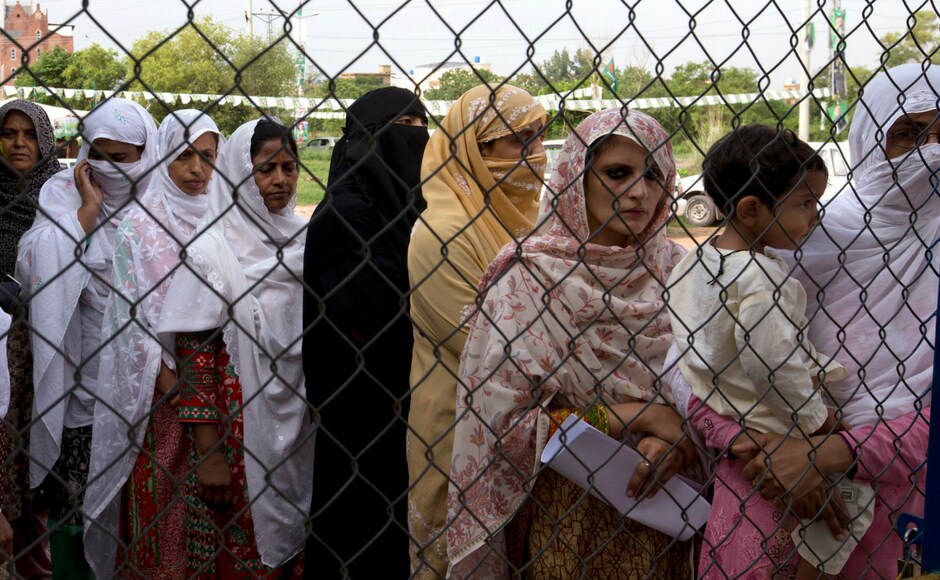 Women queue at a polling station to cast their votes in Islamabad, Pakistan. As many as 4,67,31,146 women will caste their votes in the election this year, as as compared to 5,92,24,263 male voters, as per data released by the Election Commission of Pakistan. AP Women queue at a polling station to cast their votes in Islamabad, Pakistan. As many as 4,67,31,146 women will caste their votes in the election this year, as as compared to 5,92,24,263 male voters, as per data released by the Election Commission of Pakistan. AP